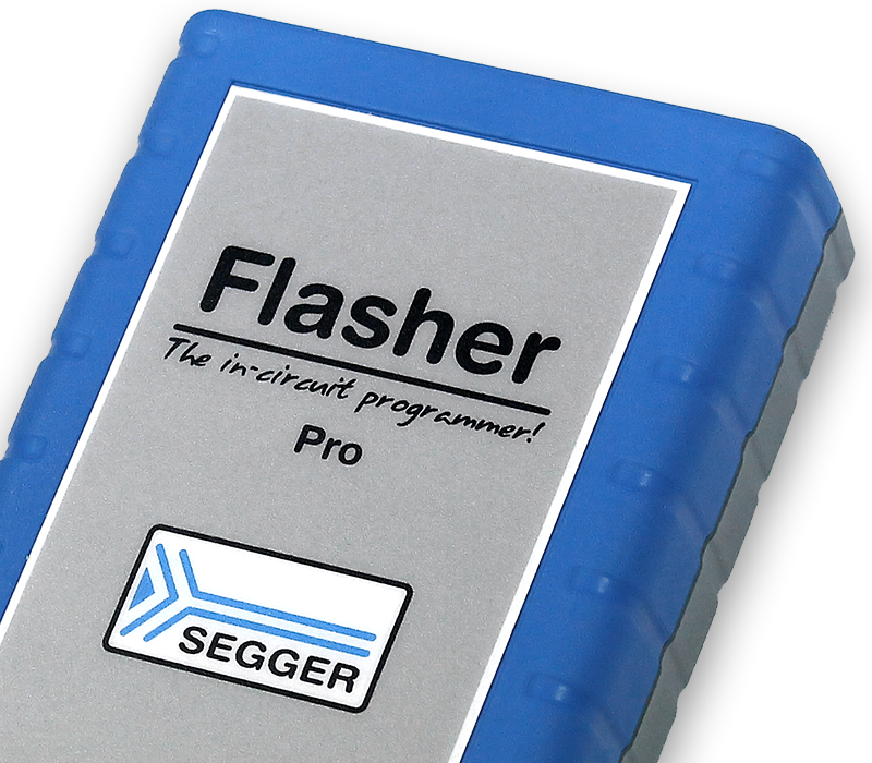 Flasher PRO A rectangular device labeled "Flasher Pro" prominently features a silver background with black text. Below, the SEGGER logo is displayed. The device is encased in a blue rubber material, designed for in-circuit programming.