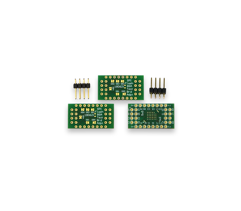 SEGGER (Q)SPI Flash Evaluator Adapter board Pack for BGA Three green printed circuit boards (PCBs) are displayed, featuring various components and solder points. Alongside, there are several gold-plated header pins. The PCBs include labels like "SPI," "Flash," and "Adapt." The setup suggests a configuration for electronic projects or prototyping.